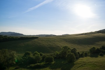 Obraz premium Sunrise and sunset over the hills and town. Slovakia
