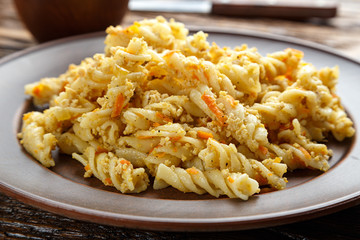 nautically pasta on the wooden background