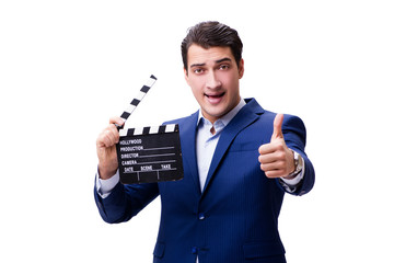 Handsome man with movie clapper isolated on white