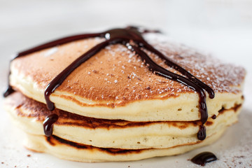Cooking step of american pancakes. Breakfast preparation process. Crepe with chocolate