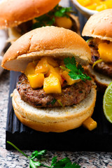 turkey burgers with mango salsa .selective focus