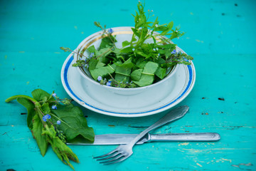 Wicker basket with fresh herbs