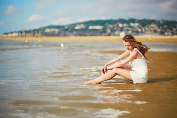 Woman enjoying her vacation by ocean or sea