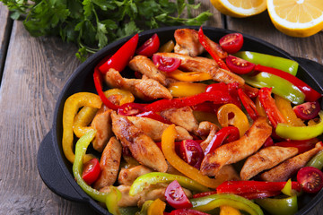 Fried chicken fillet with pepper fajitas