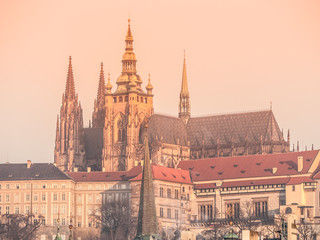 Towers of Saint Vitus Cathedral on Prague Castle illuminated by sun, Prague, Czech Republic.
