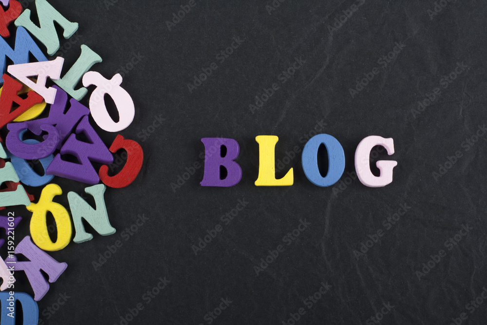 Fototapete blog word on black board background composed from colorful abc alphabet block wooden letters, copy s