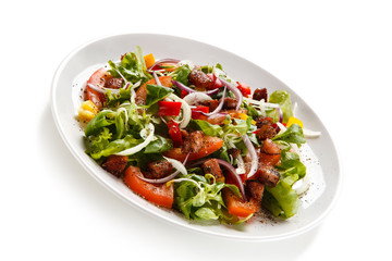 Salad with smoked ham on white background 