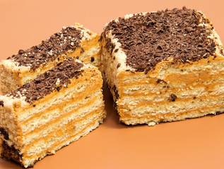 biscuit Swiss roll isolated on brown background