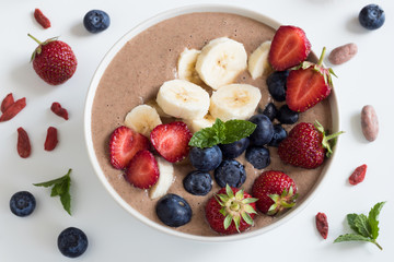 Summer breakfast - breakfast bowl with strawberries and blueberries