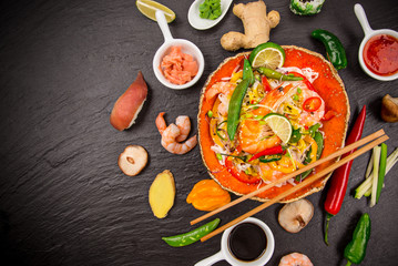 Various of asian meals on rustic background , top view , place for text.