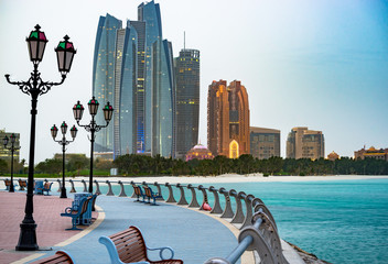 Abu Dhabi promenade at sunrise United Arab Emirates. - obrazy, fototapety, plakaty
