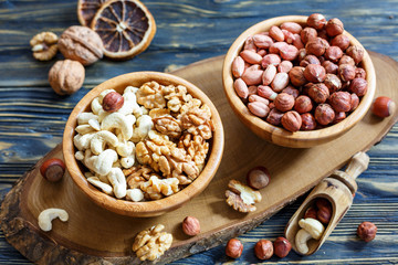 Walnuts in wooden bowls.