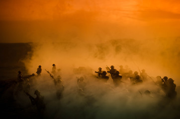 War Concept. Military silhouettes fighting scene on war fog sky background, World War Soldiers...