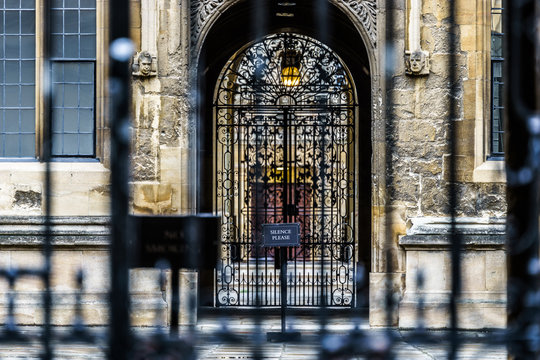 Picture taken through old iron gate to the Codrington Library in Oxford. Picture with blurry foreground