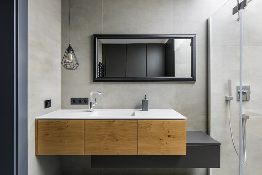 Gray bathroom with countertop basin