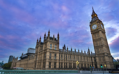 Fototapeta na wymiar Panoramic view of Big Ben and Westminster parliament in London, United Kingdom at dusk.