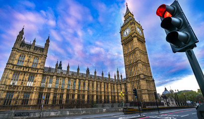 Panoramic view of Big Ben and Westminster parliament in London, United Kingdom at sunrise with red...