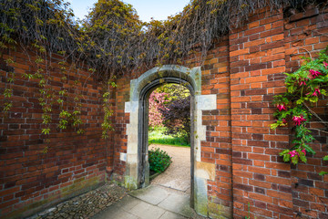 Brick walled garden with secret doorway