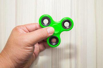 Green Fidget finger spinner toy image