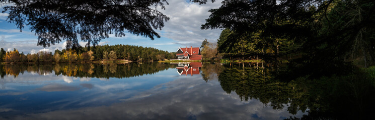Fototapeta na wymiar Wooden Lake House in Golcuk National Park