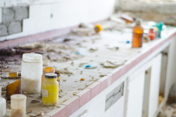 Abandoned chemical laboratory colorful Broken poison bottles