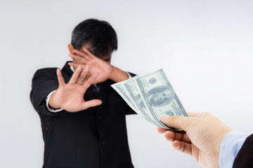 Businessman refuses to receive money - no bribery and corruption concept