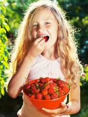 Child with strawberry