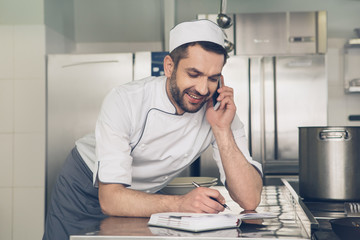 Man japanese restaurant chef working in the kitchen