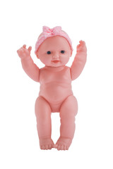Cute little plastic baby doll with blue eyes sitting  isolated on white background