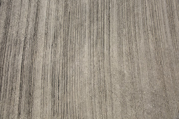 Rough, spontaneously imposed on the wall is cement plaster. The texture of the background.