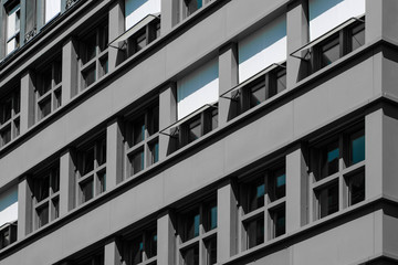 grey building facade - apartment house exterior