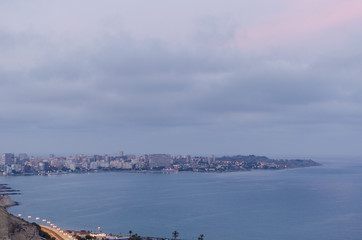 Alicante Santa Barbara castle with panoramic aerial view of the famous tourist city in Costa Blanca, Spain.