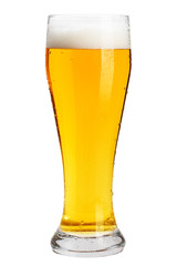 A glass of cold beer with foam, clipping path, bubbles in a drink, on a white background, isolated