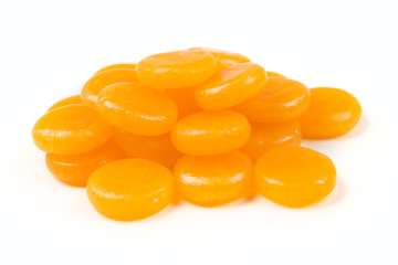 Butterscotch hard candies isolated on a white background