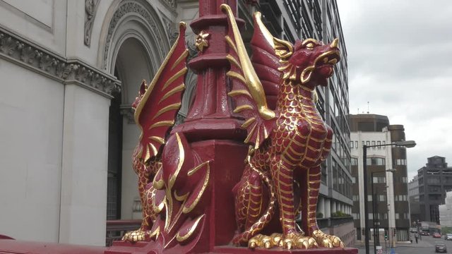 Statues of mythical dogs with wings.