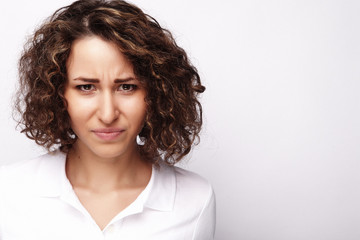 Portrait of dissatisfied young woman