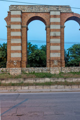 Fototapeta premium Night photo of Ruins of Roman Aqueduct in city of Plovdiv, Bulgaria