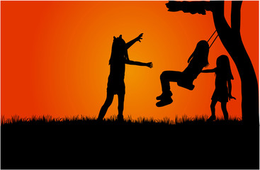 Silhouettes of children playing.