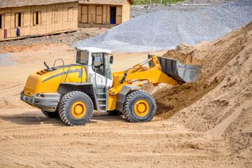 Fototapeta na wymiar landscape photo of wheel loader in construction site