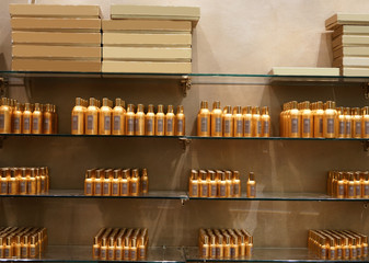 Stand with perfume products in luxury shop