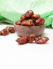 Dried dates in small bowl