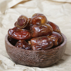 Dried dates in small bowl
