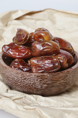 Dried dates in small bowl 