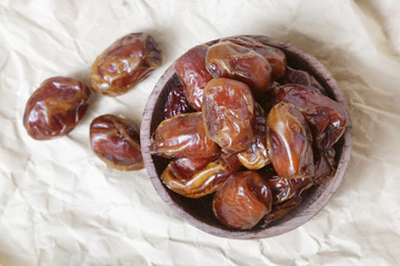 Dried dates in small bowl