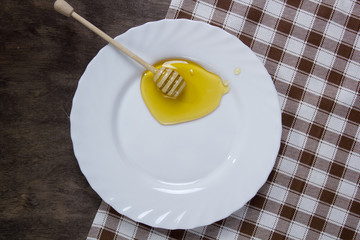 White plate with honey