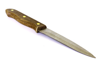 Knife with pointed tip and wood handle on isolated white background.