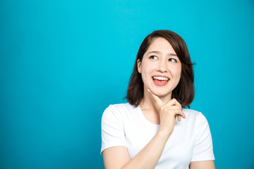 young woman looking up, getting an good idea concept