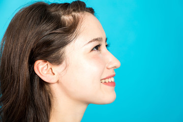 profile of young woman. beauty and skincare concept.