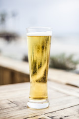 Ice cold beer in a tall glass