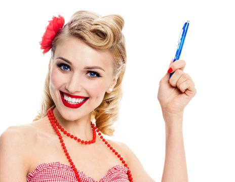 young woman with pen, in pin-up style clothing, isolated
